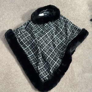 Brand: laundry; faux fur poncho; patterned: plaid; black and white; one size